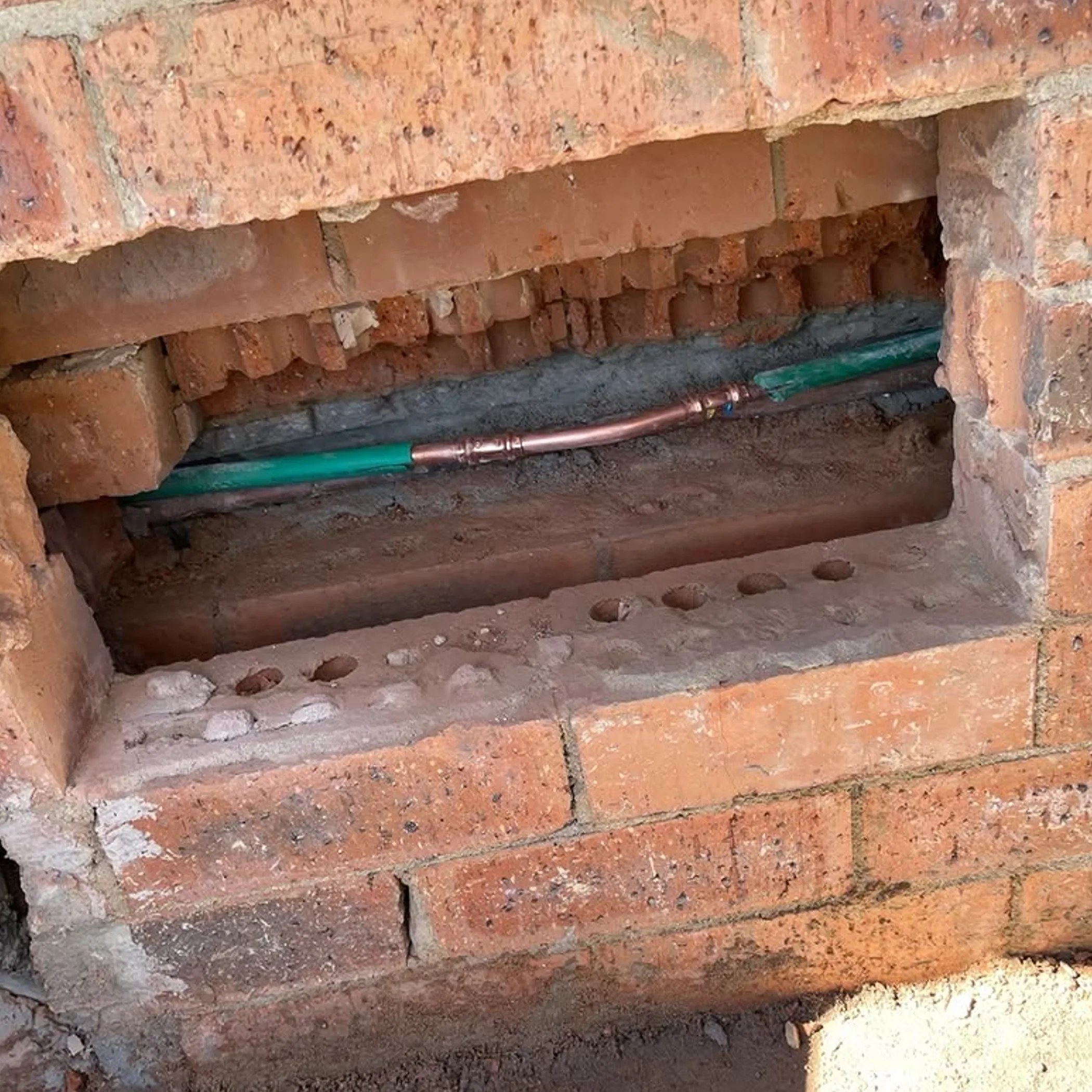 plumbing pipework and wall cavity